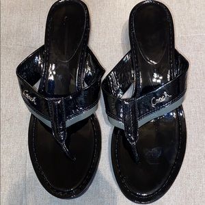 Women’s Black Coach wedge sandals